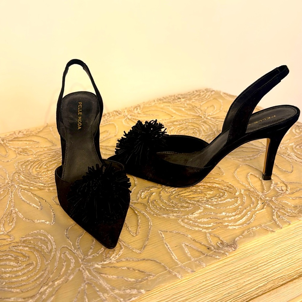 Pelle Moda black sling back heels
Never worn